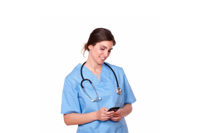 Female nurse using mobile phone