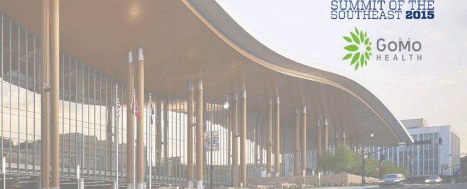 A modern building with a distinctive, curved roof design, and in the top corner, there is text that reads "Summit of the Southeast 2015" alongside a logo for "GoMo Health."