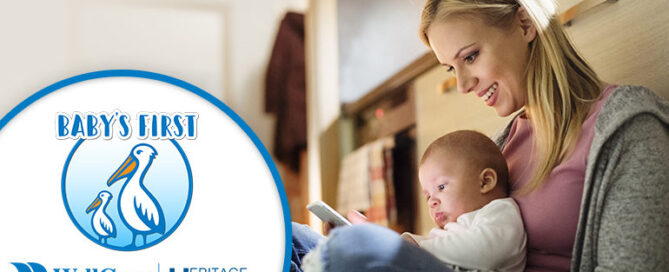 Woman smiling down at a baby lying and is lookingat her phone. In the foreground, there is a logo titled "Baby's First".