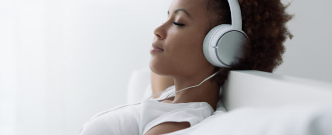 Woman relaxing and listening to music.