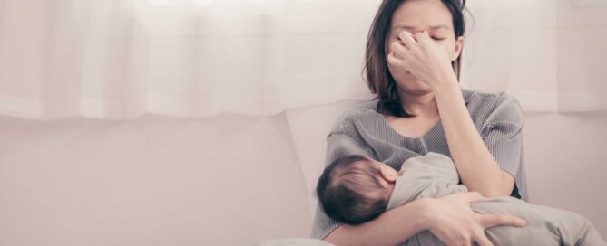 Mother experiencing postpartum depression.