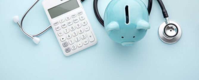 Stethoscope, piggy bank, and calculator.