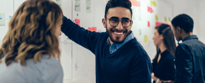 A group of people collaborating in a creative workspace.