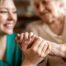 caregiving an elderly woman