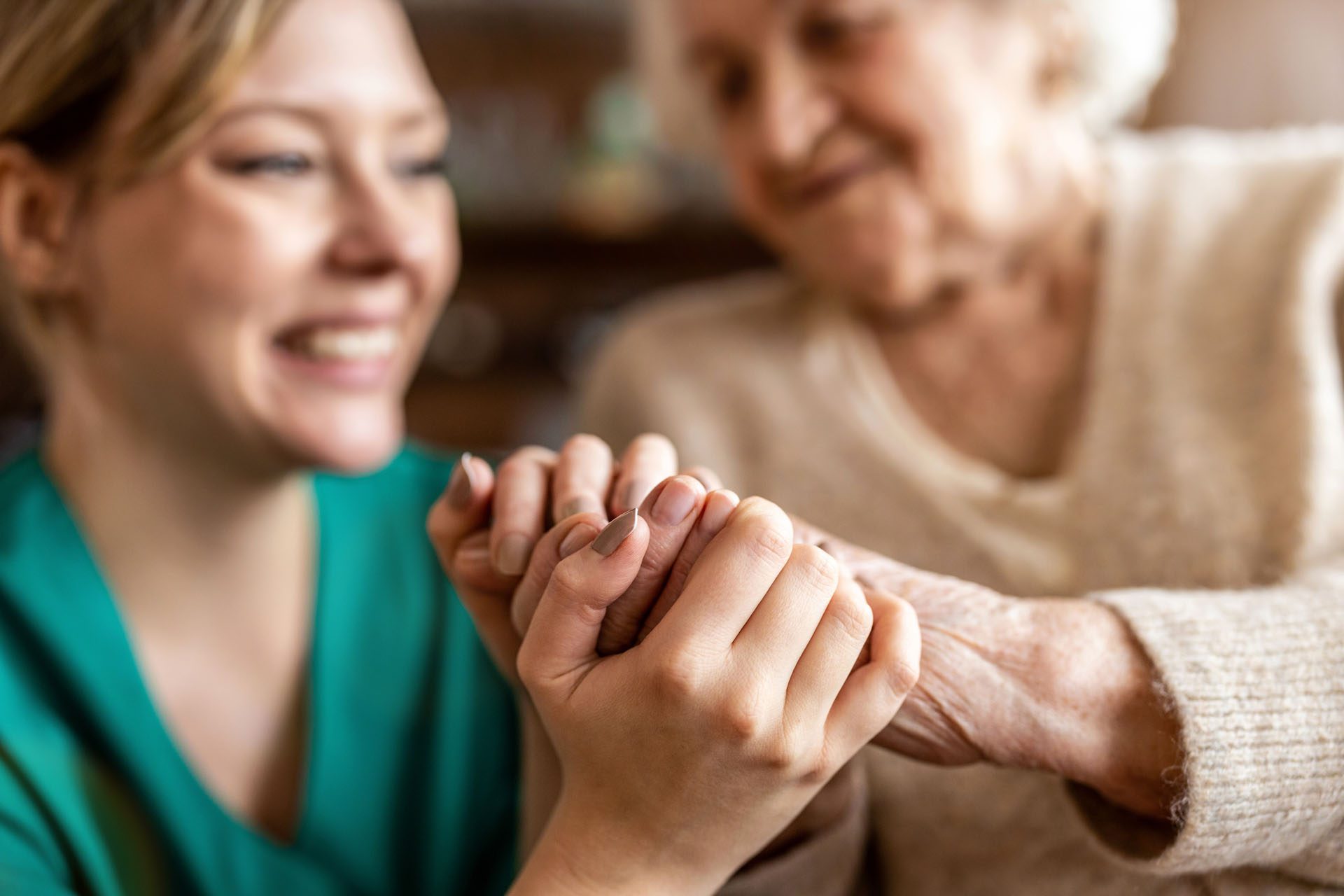 caregiving an elderly woman