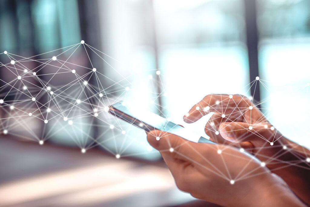 Businesswoman using mobile smartphone online.