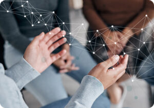 Close-up of hands gesturing as if explaining or sharing ideas.