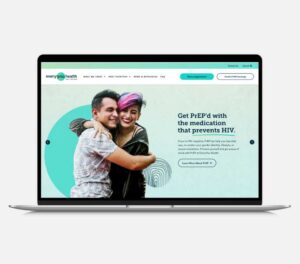 Laptop displaying an Everyday Health PrEP HIV prevention webpage with a smiling couple